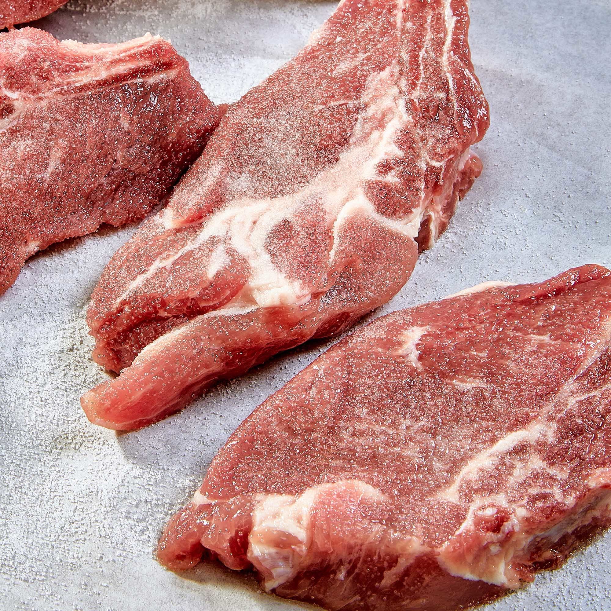 Close-up of meat after McCormick tenderizer, showing improved texture.