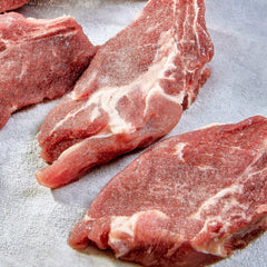 Close-up of meat after McCormick tenderizer, showing improved texture.