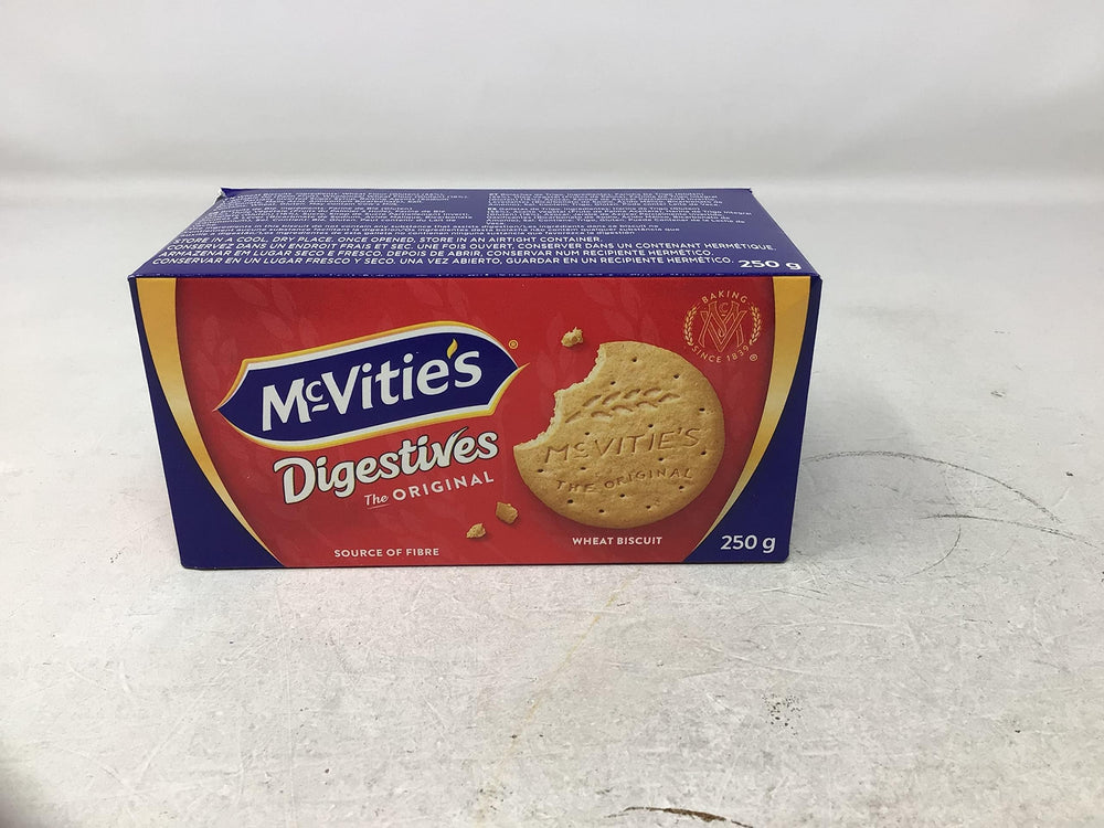 Four McVities Digestives Wheat Biscuits boxes arranged for sharing