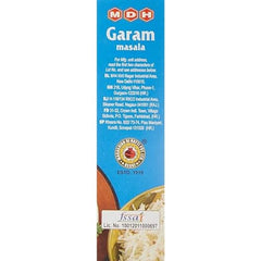 MDH Garam Masala ground spice pile highlights warm, peppery notes for gravies.