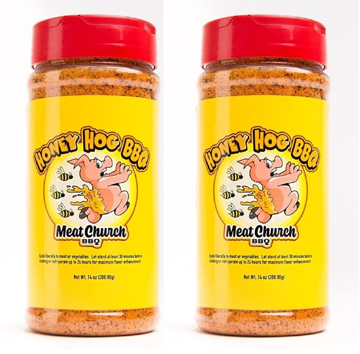 Meat Church Honey Hog rub bottles pouring to season pork and vegetables with sweet heat.