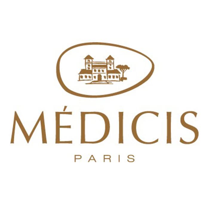 Medicis event table setup featuring candied almond dragees as dessert accents