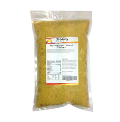 Medley Hills Farm nutritional yeast flakes in a resealable bag, ideal cheese substitute.