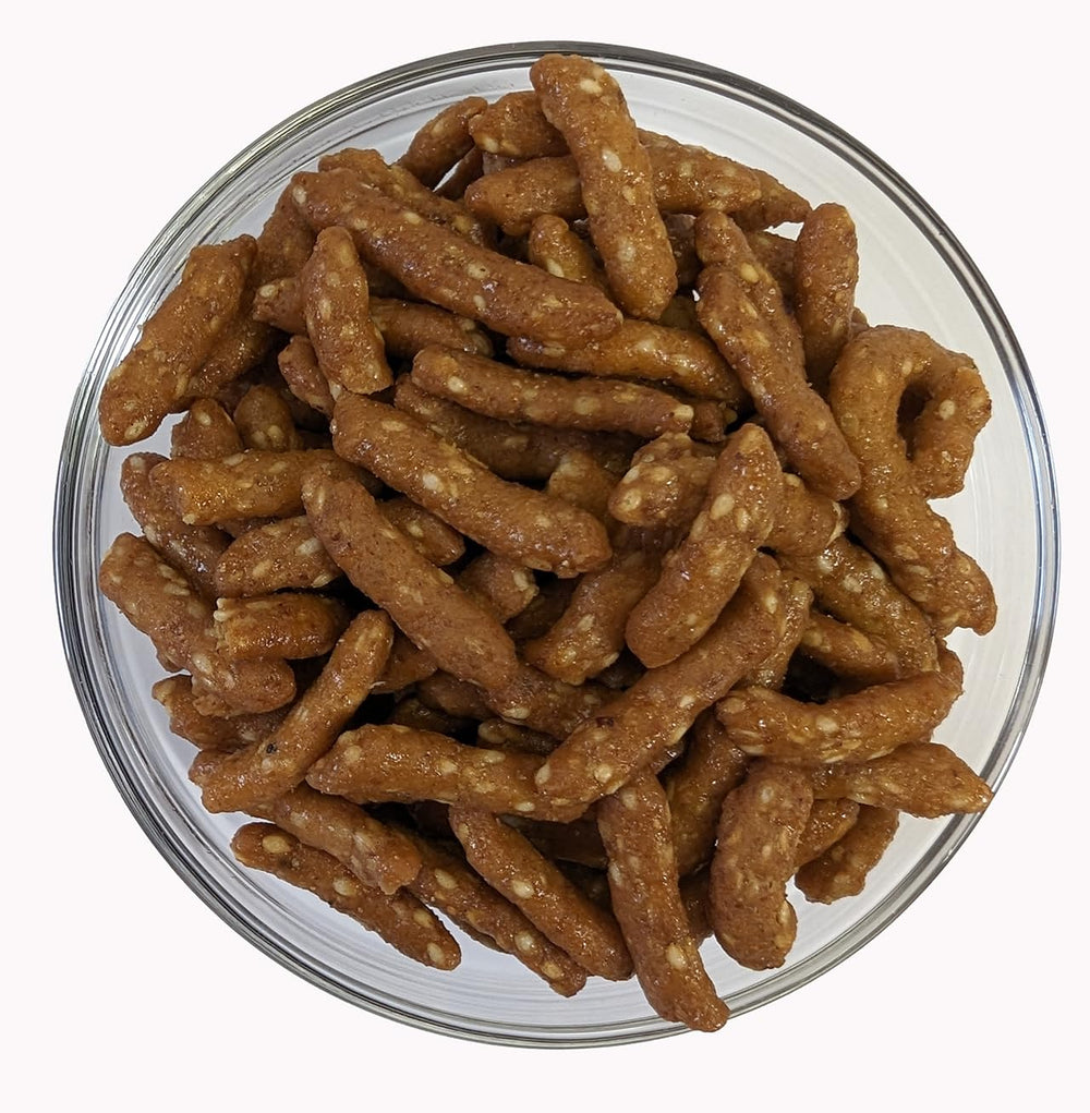 Medley Hills Farm sesame sticks honey roasted on shelf display signals premium snack option.