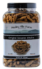 Medley Hills Farm Original Sesame Sticks in reusable container for fresh, convenient snacking.
