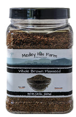 Medley Hills Farm whole brown flaxseed in container ready for baking and smoothies