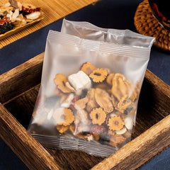 Megacephalus Six Treasure Tea dry herbs closeup showcases real ingredients ready to steep.