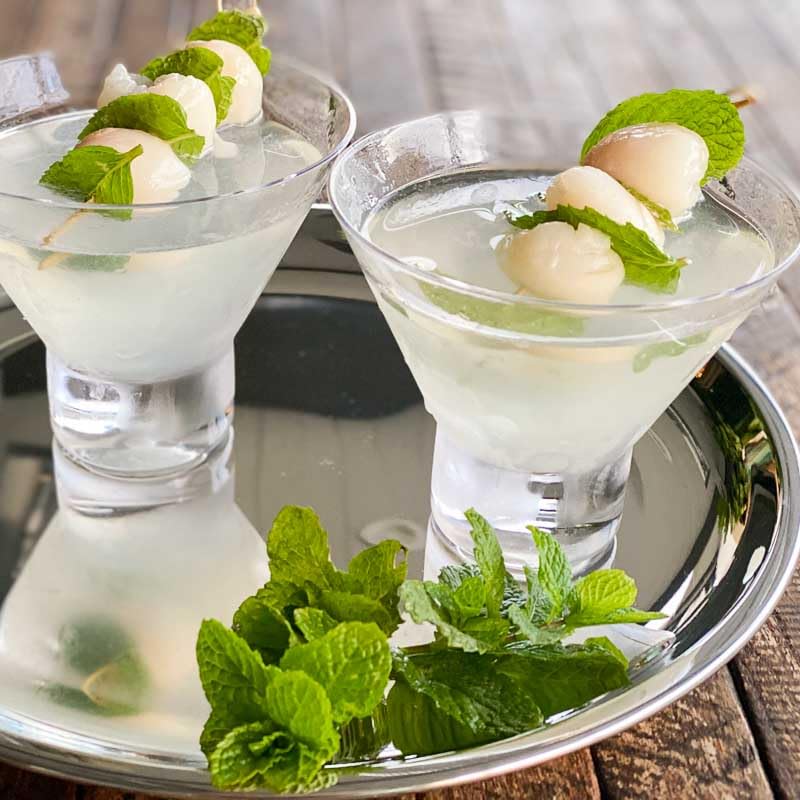 Mekoman lychee cocktail scene highlights exotic floral aroma.