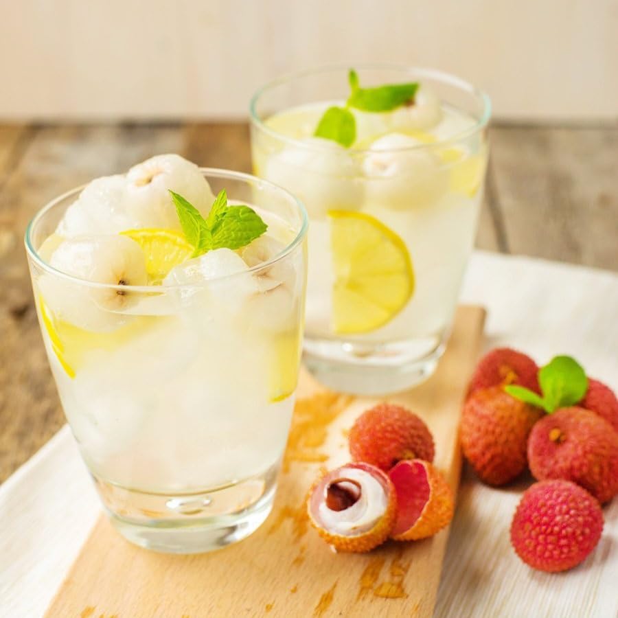 Mekoman lychee sorbet close-up emphasizes vibrant color and refreshing taste.