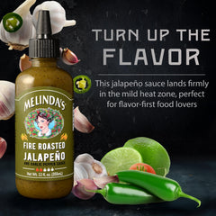Close-up of fire-roasted jalapeños and garlic in Melinda's sauce for fresh taste.