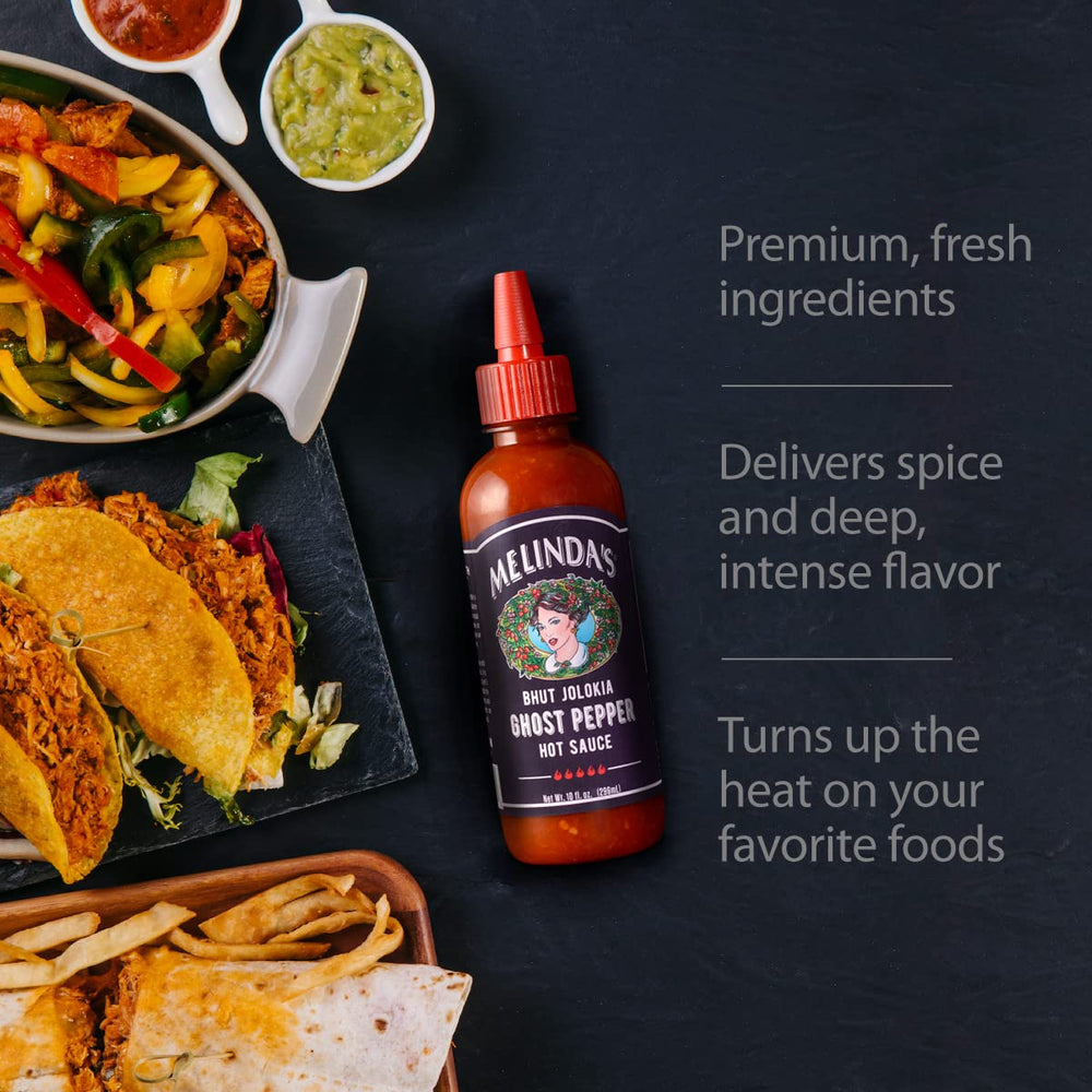 Melinda's Ghost Pepper sauce drizzled over fried chicken for a spicy crust.