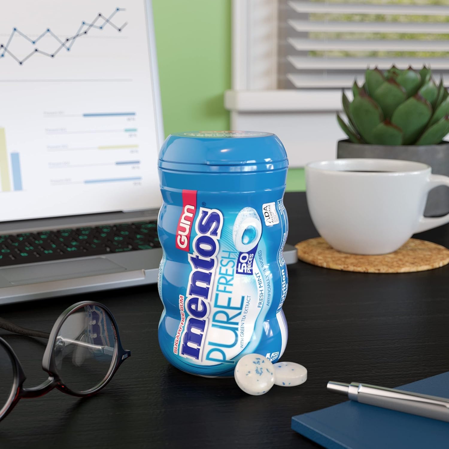 Mentos Pure Fresh bottle highlighting 50 pieces and value for sharing.