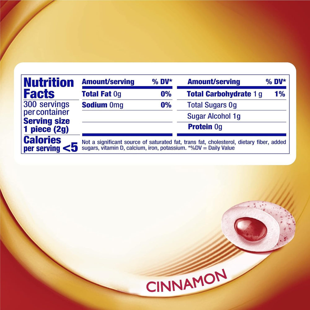 Close-up of Mentos gum piece reveals cinnamon flavor and sugar-free formula.