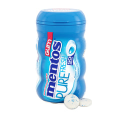 Mentos Pure Fresh sugar-free gum bottle close-up with mint flavor for desk freshness.