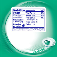 Mentos Pure Fresh gum pieces in a resealable bottle for on-the-go freshness.
