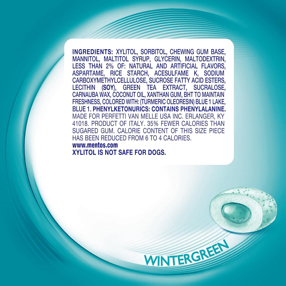 Mentos Pure Fresh Wintergreen bottle in a purse for convenient fresh breath.