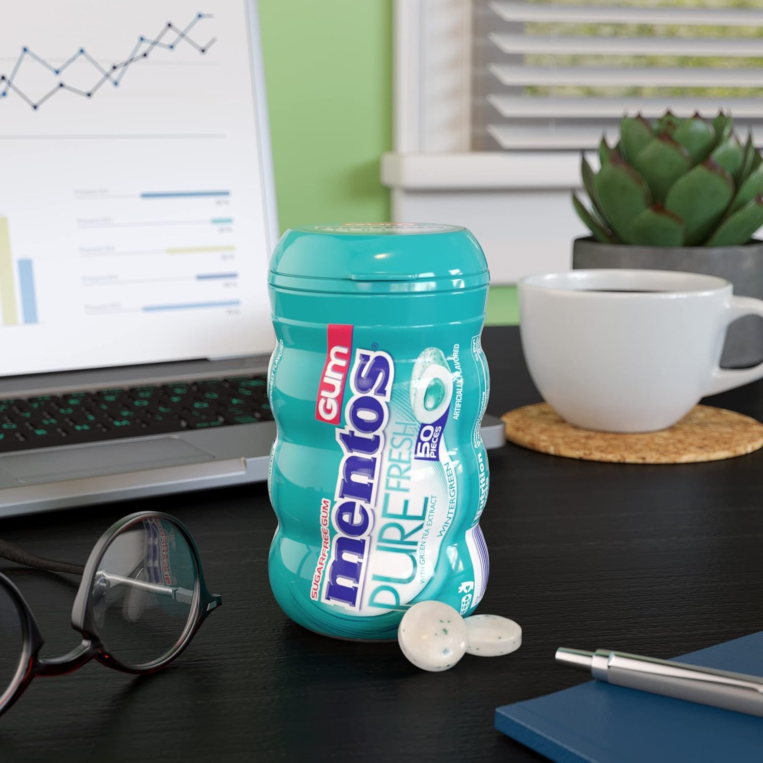 MENTOS Wintergreen bottle pictured on a desk for everyday use.