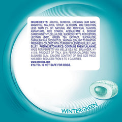 A Mentos gum piece delivering crisp wintergreen flavor for quick breath refresh