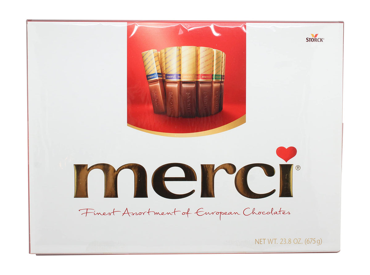Merci assorted chocolates box front, gift-ready European indulgence.