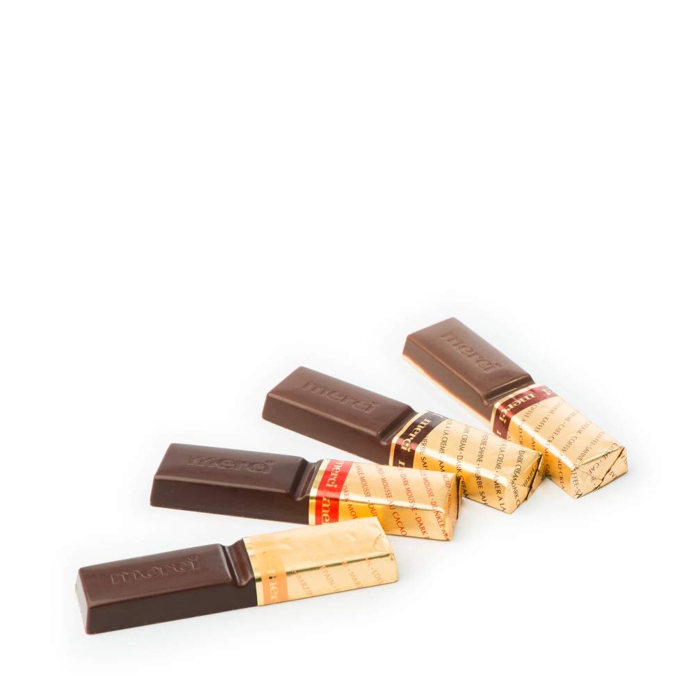 Merci Finest dark chocolates with elegant packaging enhances gifting.