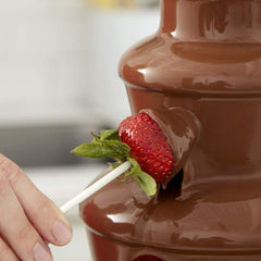 Merckens Cocoa Lite wafers dipping strawberries for glossy finish