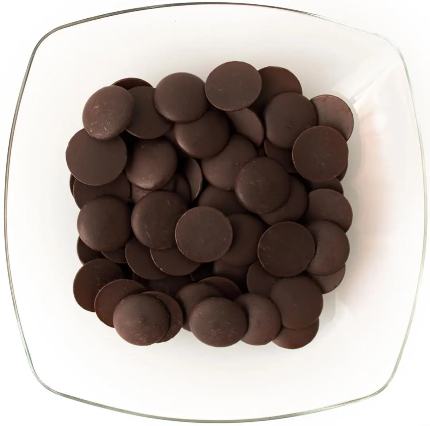 Close-up of Merckens dark cocoa wafers showing rich texture and shine