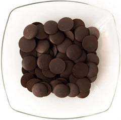 Close-up of Merckens dark cocoa wafers showing rich texture and shine