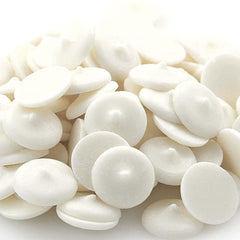 Merckens white chocolate wafers ideal for dipping pretzels and fruits with even coating.