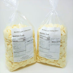 Finished treats dipped in Merckens white coating for a smooth finish.