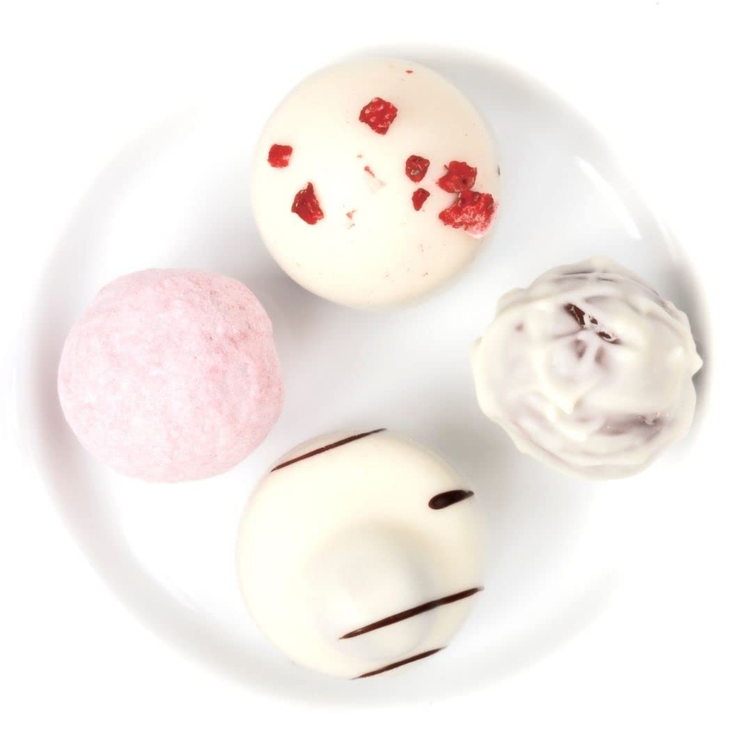 Drizzle Merckens white chocolate to add elegance to cakes and desserts