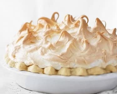 MERINGUE POWDER on the kitchen counter supports quick frosting projects.