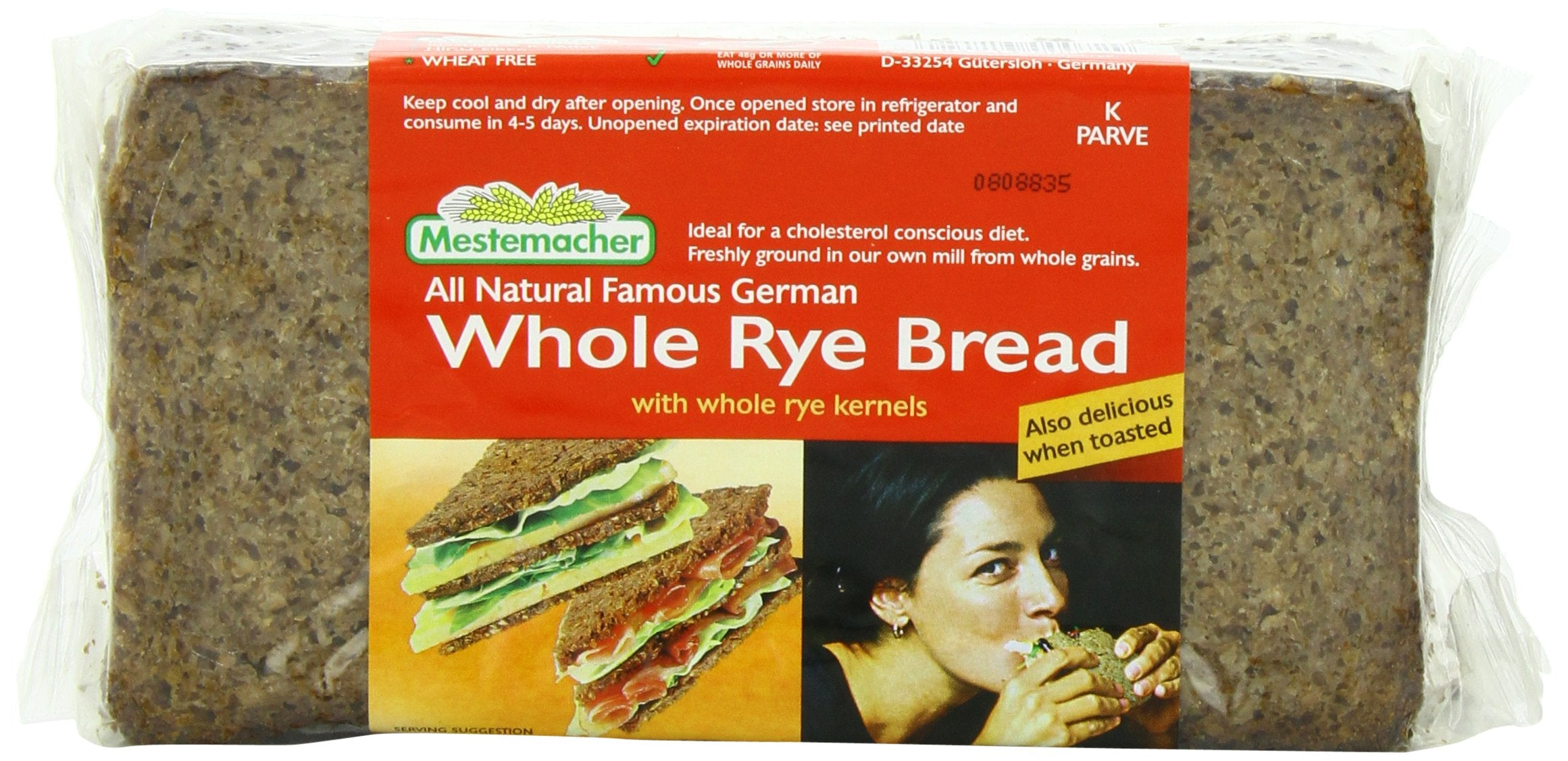 Mestemacher Whole Rye Bread loaf on cutting board, ready for hearty sandwiches.
