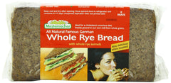 Mestemacher Whole Rye Bread loaf on cutting board, ready for hearty sandwiches.