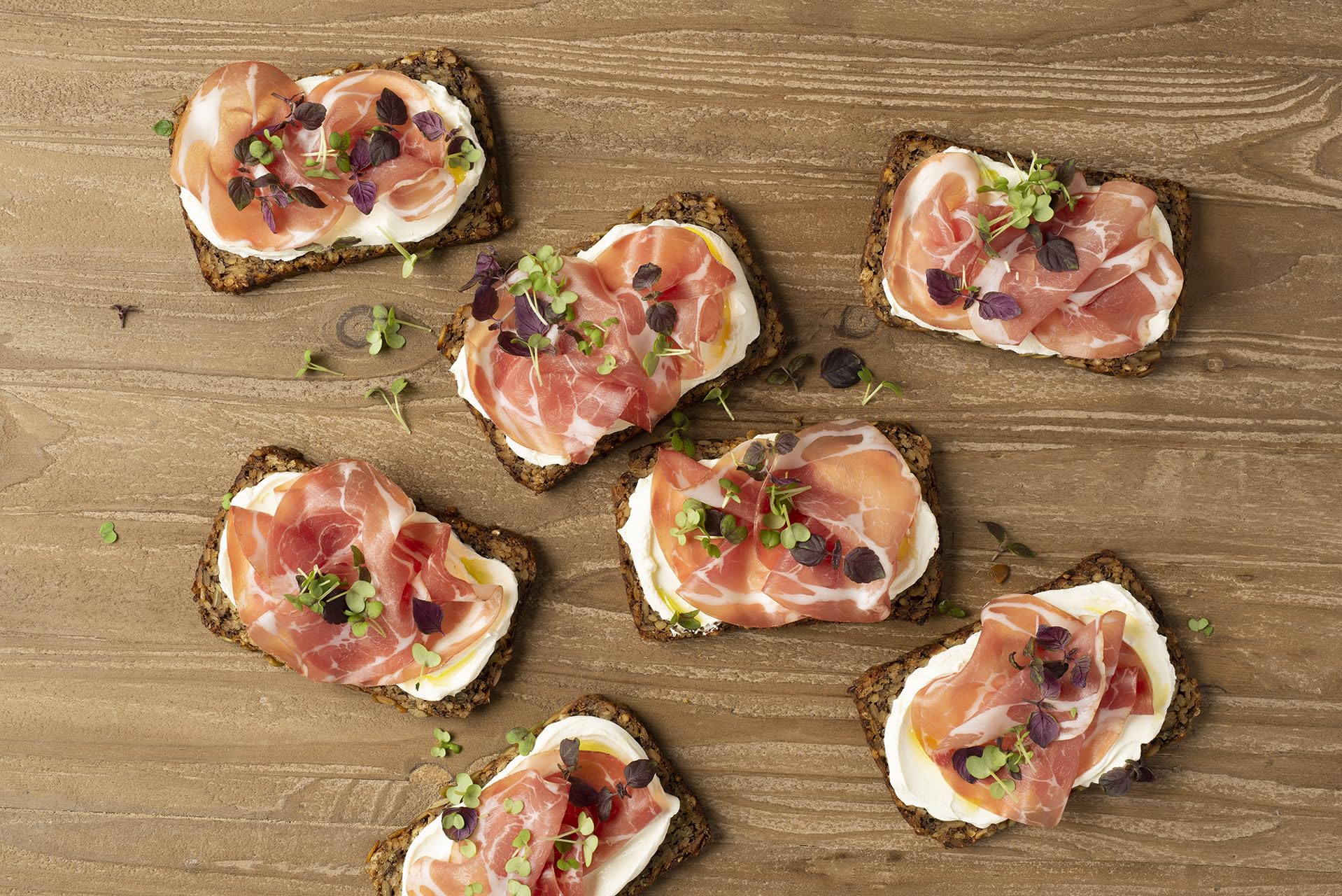 Mestemacher Organic Three Grain Bread knife-cut slices, showing crumb texture