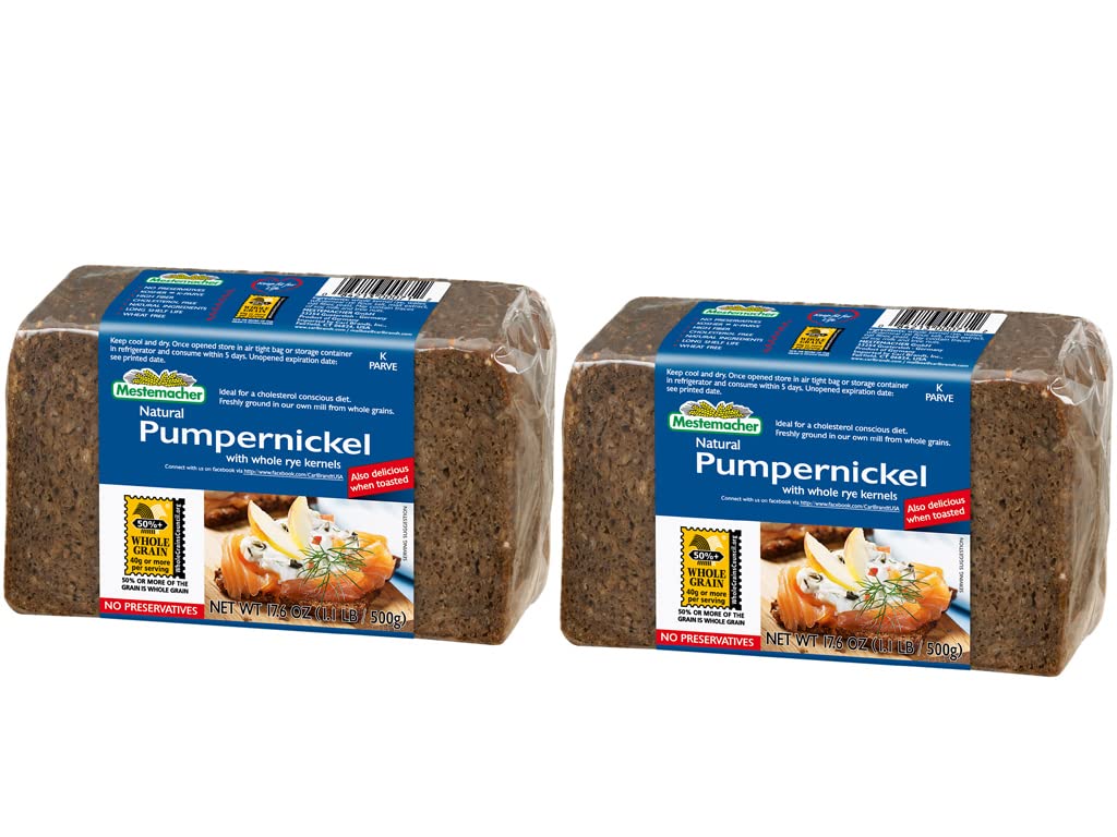 Mestemacher whole grain pumpernickel bread loaf on cutting board, fiber-rich and perfect for wholesome toast.