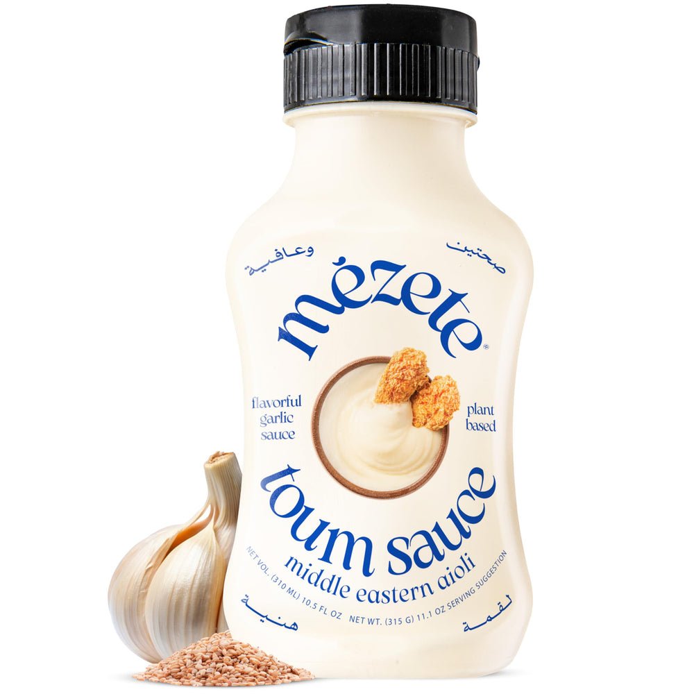 Mezete Toum bottle-pour shows creamy garlic sauce ideal for quick dips and spreads