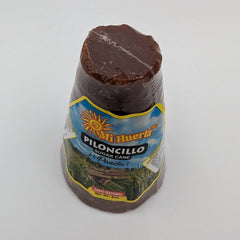 Mi Huerta Piloncillo cone being grated for recipes