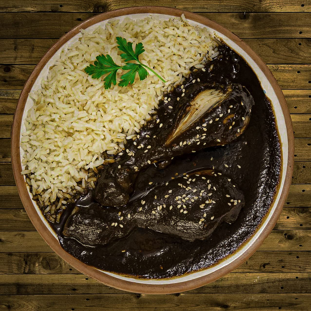 Mi Mole served over chicken tacos for a vibrant dinner.