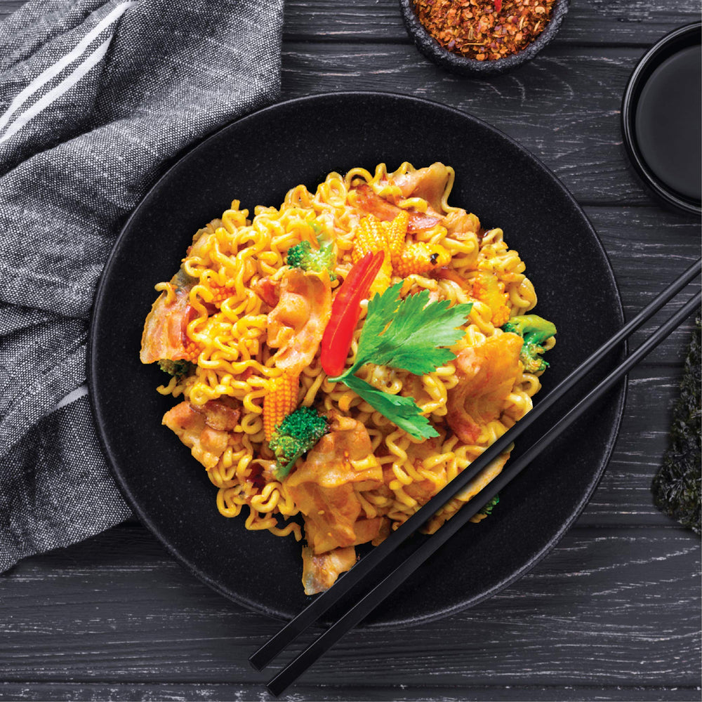 Mi Sedaap sauce gloss signals rich, savory flavor.