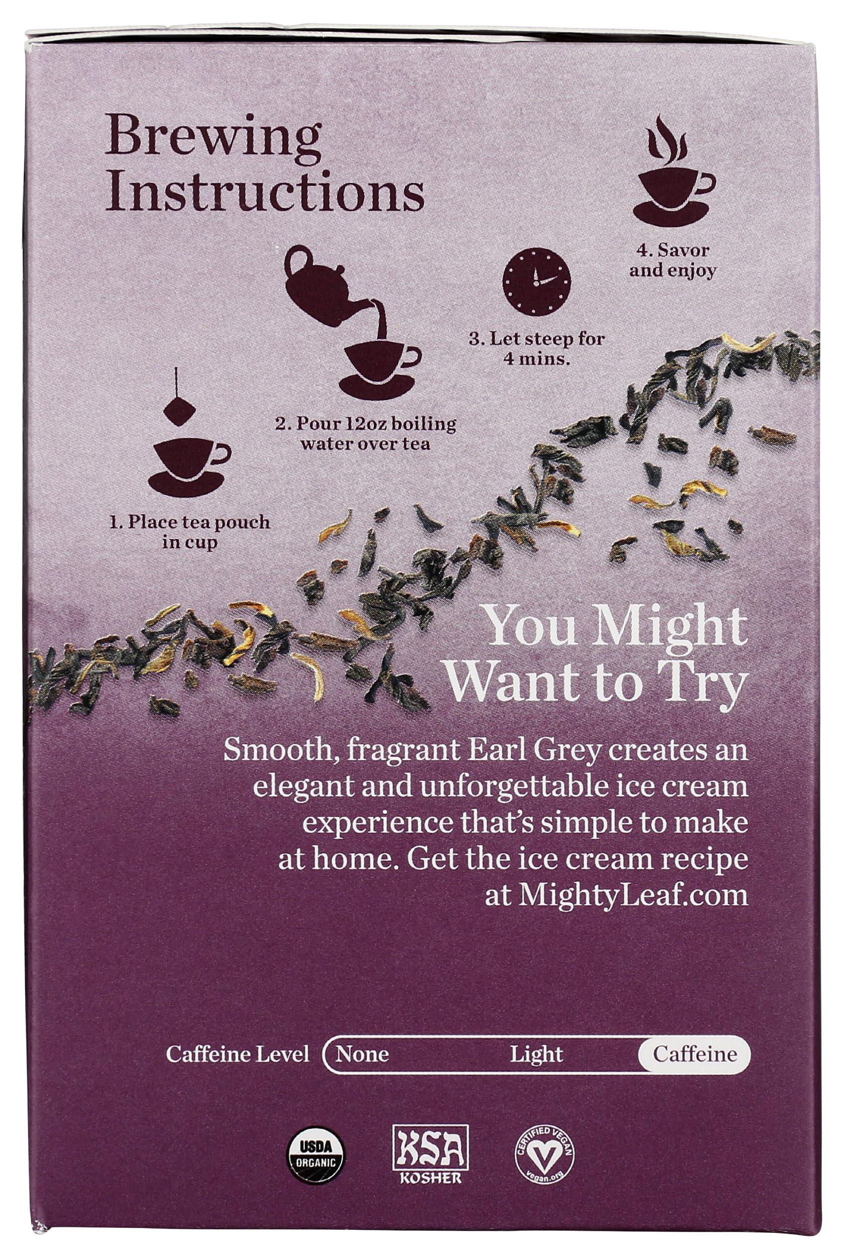 Mighty Leaf ceramic mug with Earl Grey steam shows a comforting tea moment.
