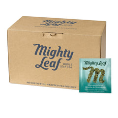 Mighty Leaf Marrakesh Mint tea pouches in foil wrap preserve freshness for a crisp brew.