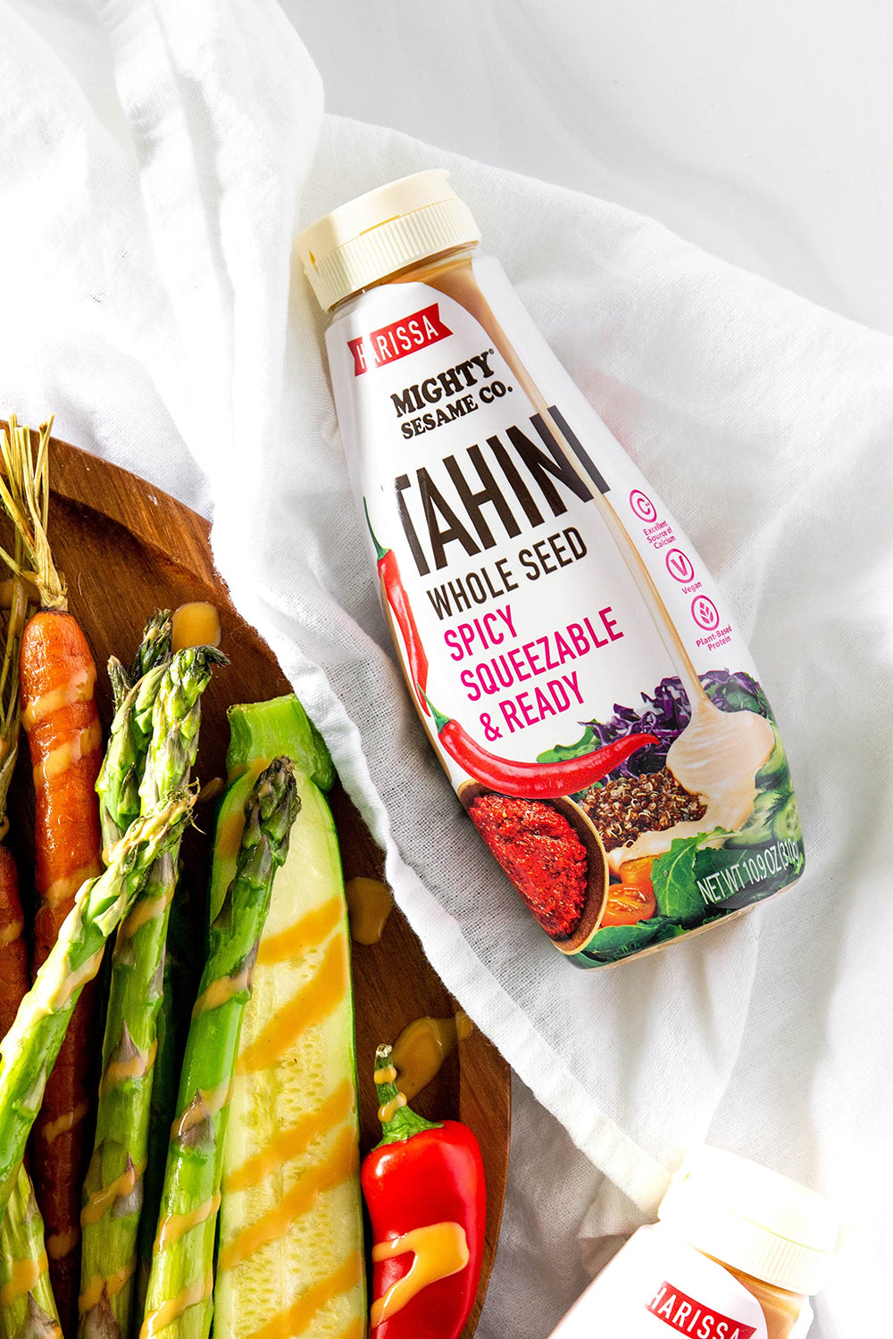 Mighty Sesame Co. spicy tahini dressing idea showcases quick, versatile sauce for proteins.