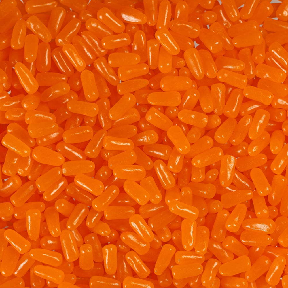 Mike and Ike Orange candies in bright color, close-up view highlights chewy texture.