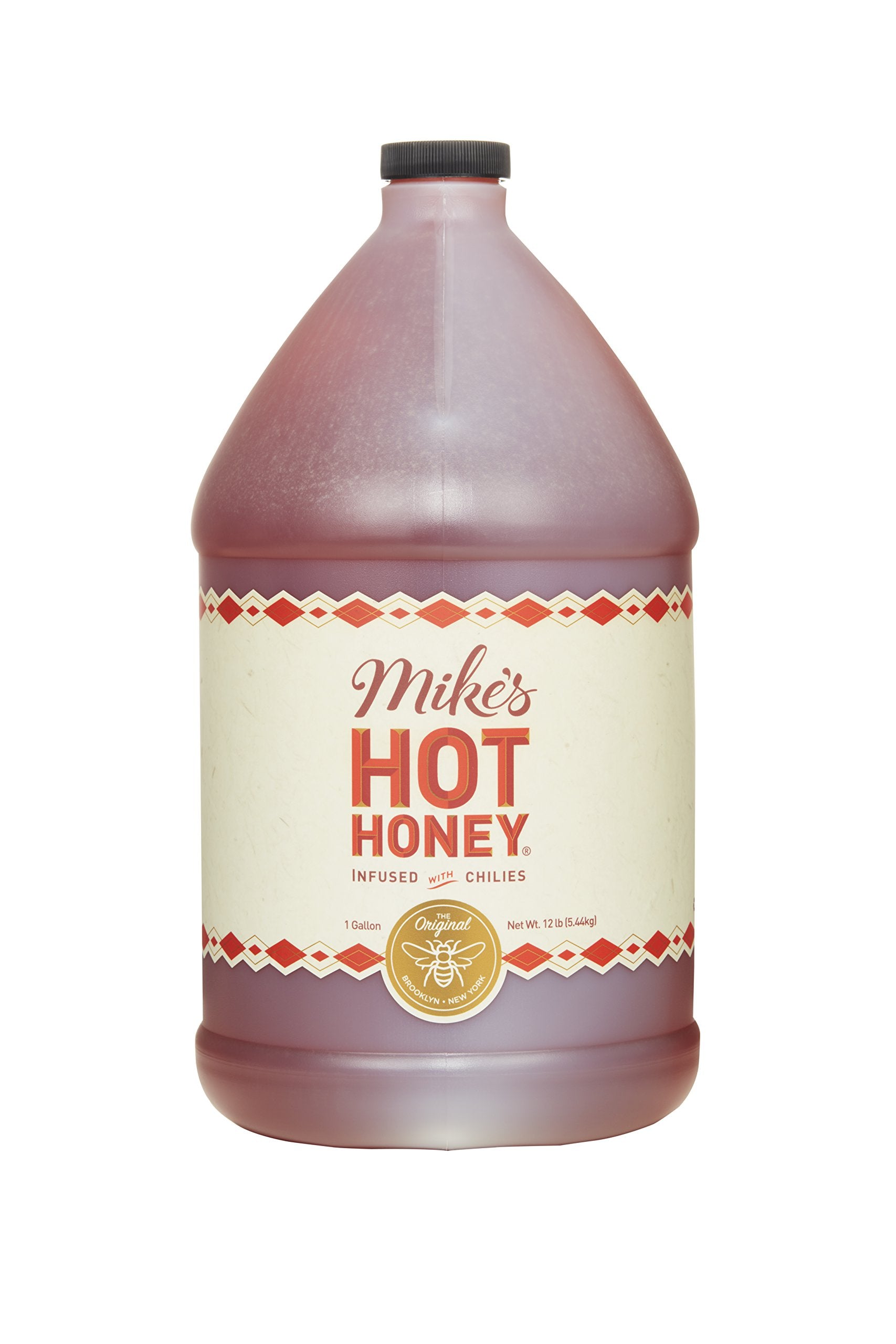 Mike's Hot Honey bottle pouring on pizza to add sweet heat