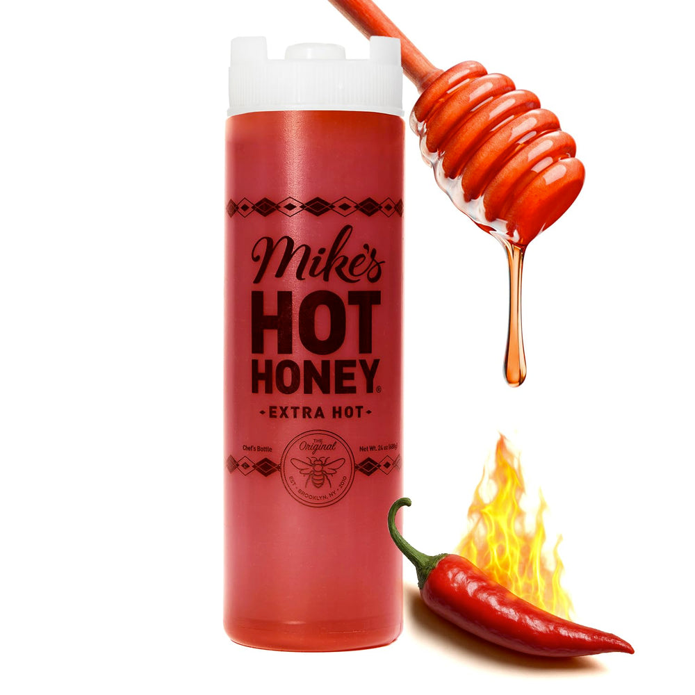 Mike's Hot Honey Extra Hot bottle drizzle on pizza glaze for perfect pairing.