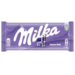 Milka Alpine Milk chocolate resting in a cool, dry place suggests proper storage.