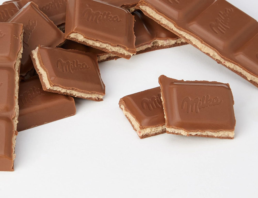 Milka Strawberry Yoghurt Chocolate wrapper, easy to slip into lunch or desk snack.