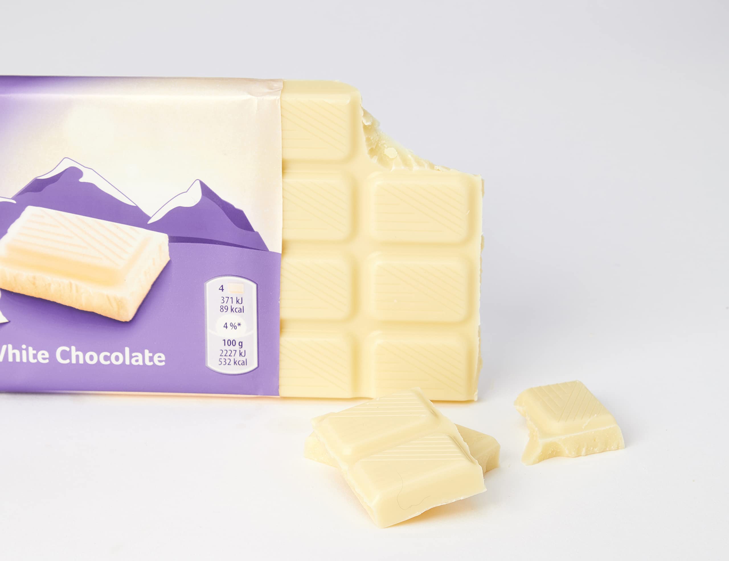 Milka 3-pack on countertop, convenient snack for gatherings.