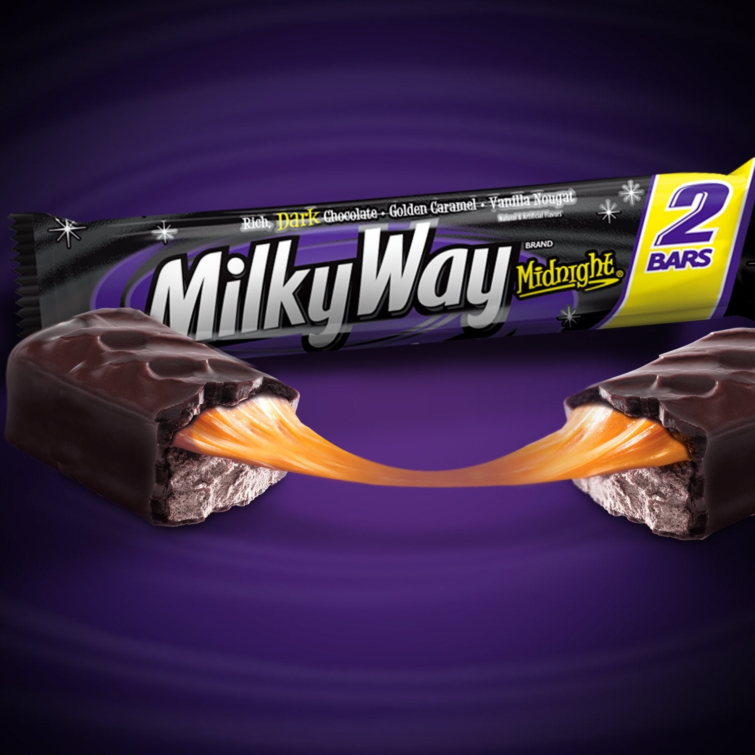 Milky Way Midnight bars in an office desk drawer for quick treats.