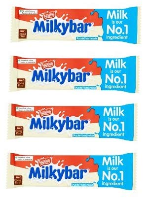 UK-imported MilkyBar white chocolate pack on a store shelf.